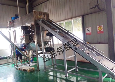 活性炭使用厂家为什么要使用自动拆包投料机？