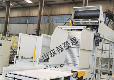 钙粉垛料拆垛拆包机是怎样完成拆垛拆包任务的？