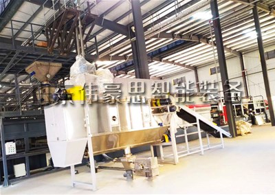 硫磺粉料自动破袋设备+管链输送机客户现场展示
