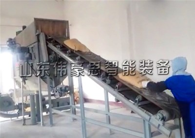 豆粕自动拆包投料站 自动破袋机上料现场