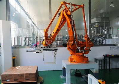 箱料全自动码垛机器人 配套全自动装箱机工作现场