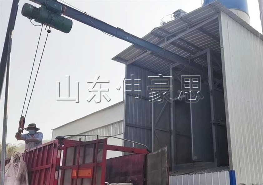 水泥吨袋自动拆包机 吨包投料站投料到水泥仓案例